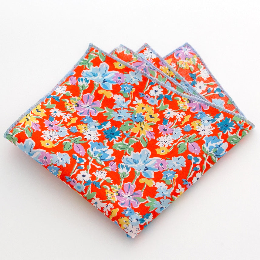 Einstecktuch 28x28cm Blumen bunt, retro auf orangem Hintergrund, hellblauer Rand